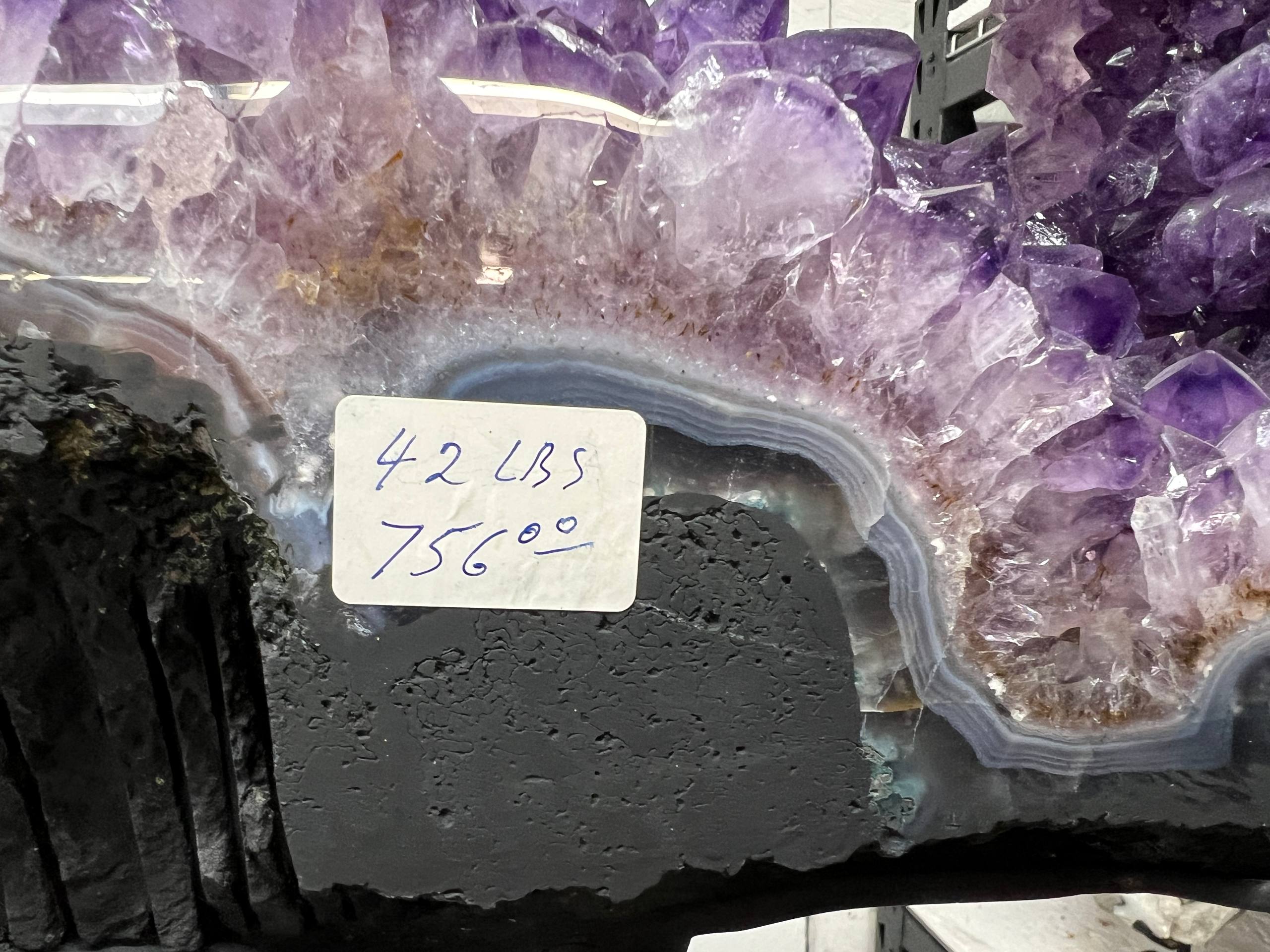 Beautiful geode on stands for display – view 1