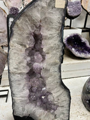 Amethyst geode stands by itself – view 1