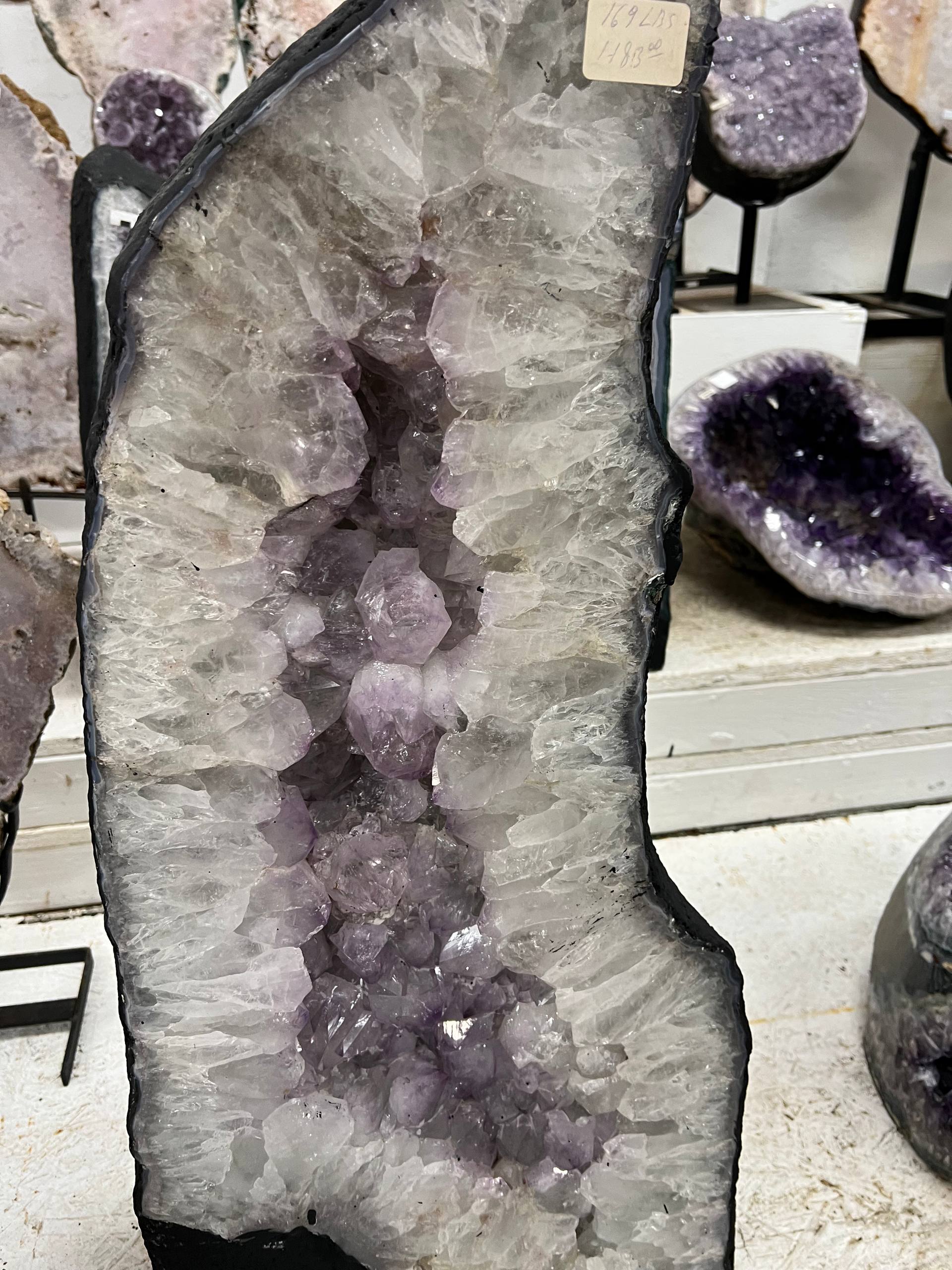 Amethyst geode stands by itself – view 1
