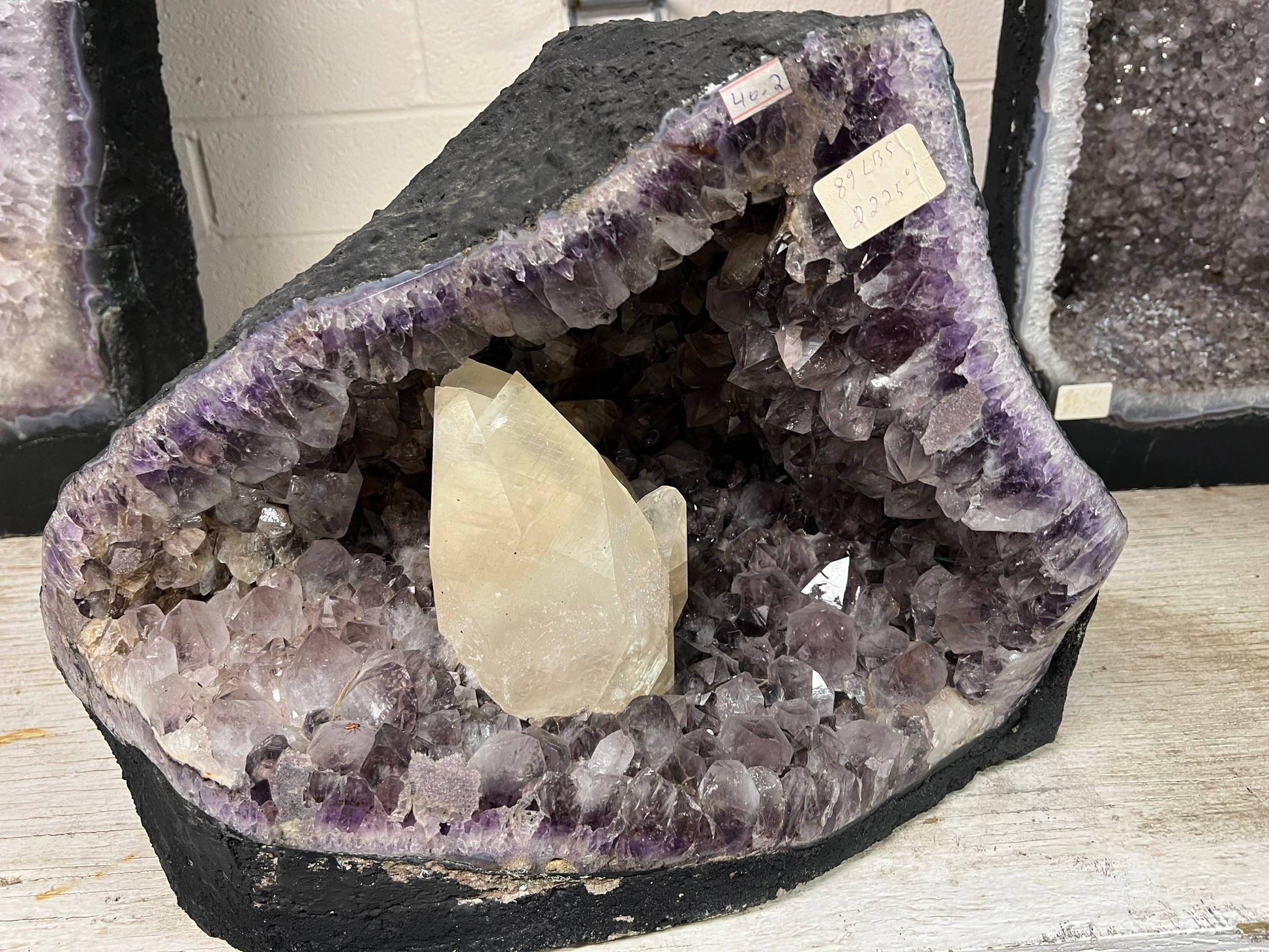 Amethyst geode with large calcite – view 8