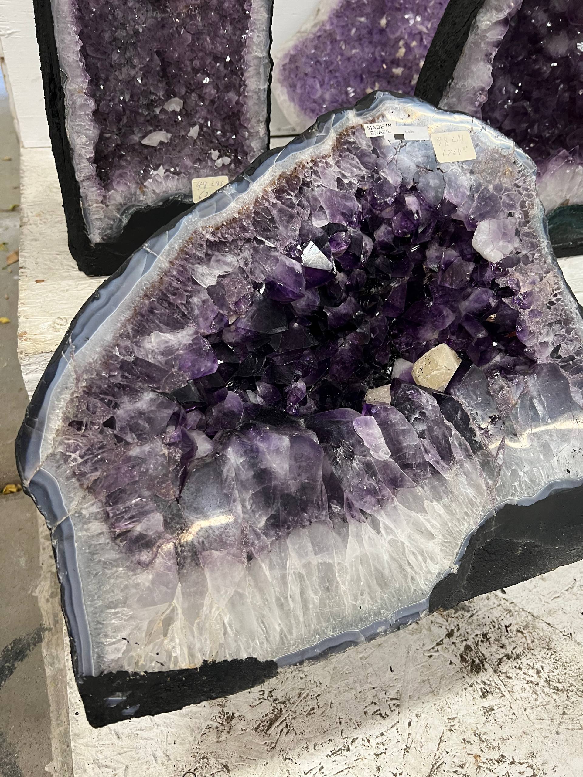 Amethyst beautiful dark purple color geode with calcite – view 1