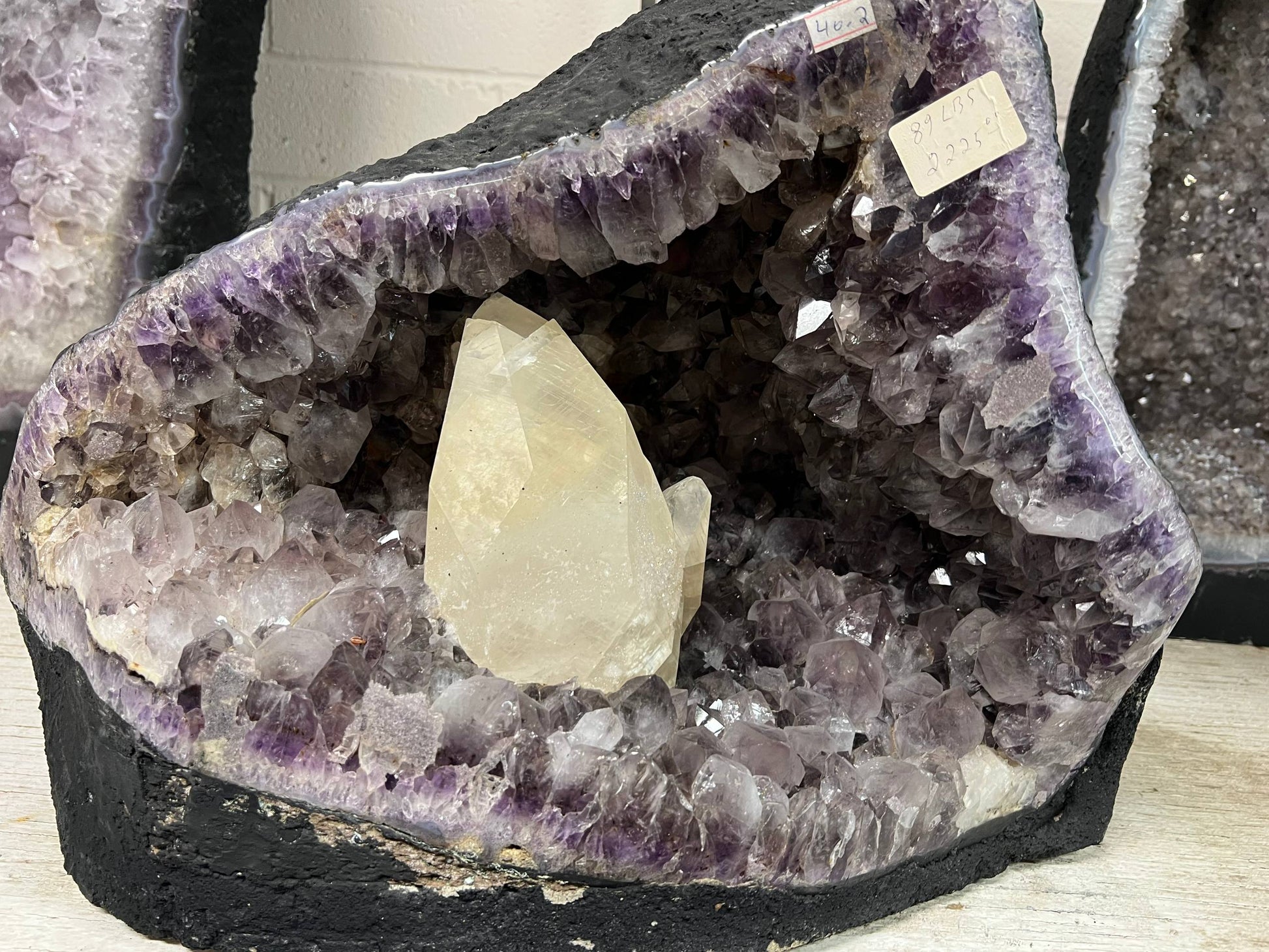 Amethyst geode with large calcite – view 1