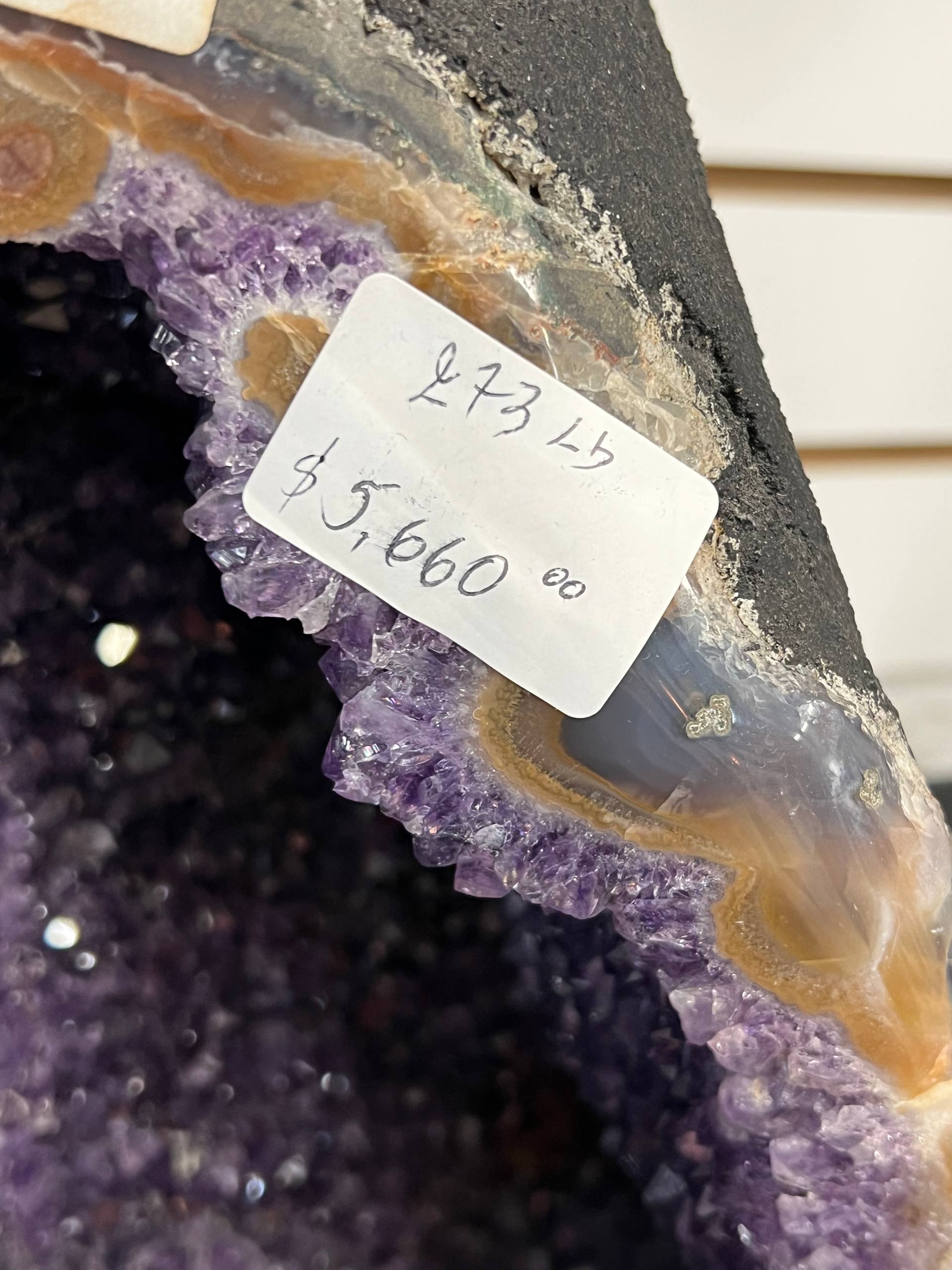 Large amethyst geode with calcite on stands – view 5
