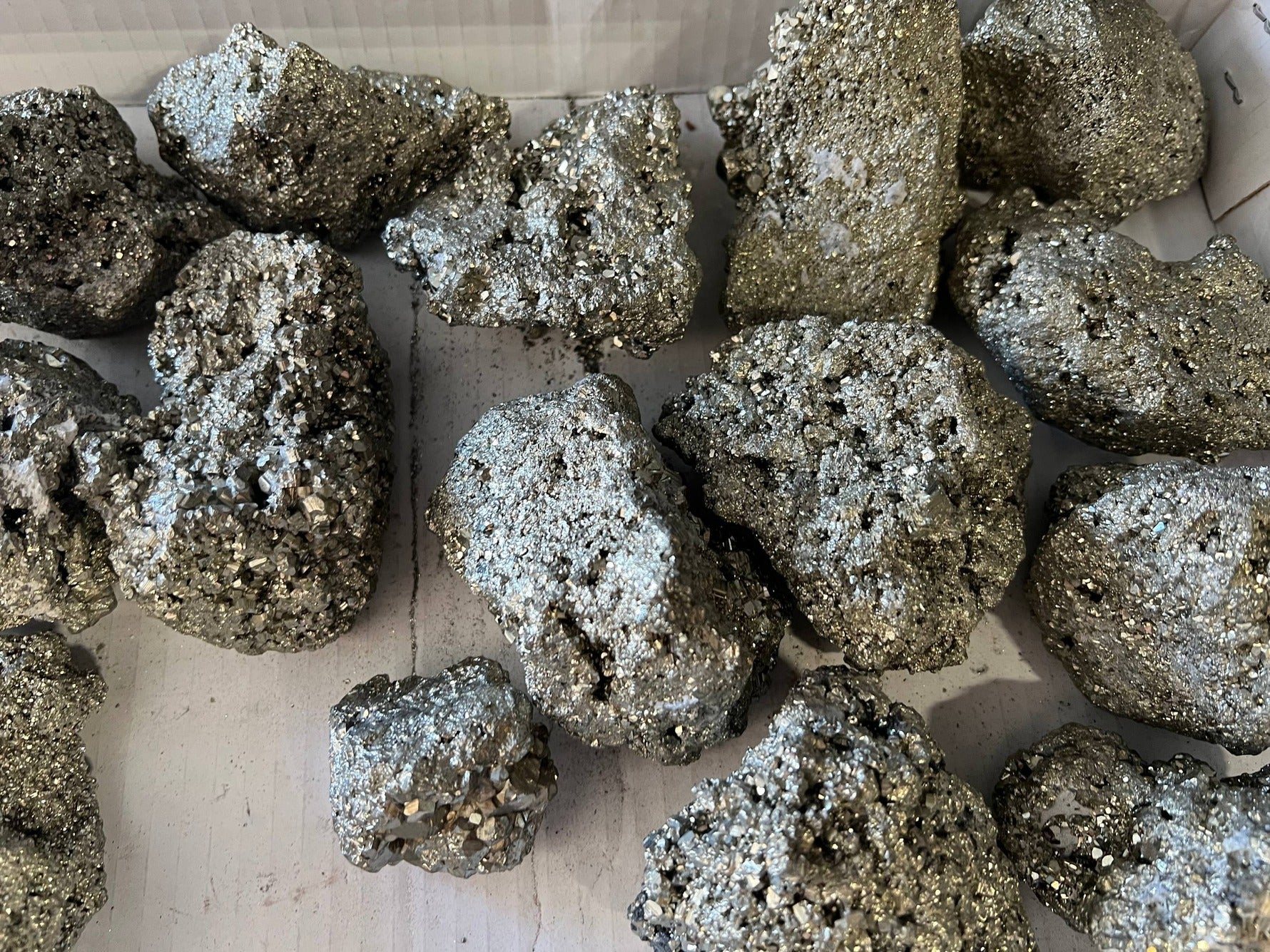 Raw Pyrite Chunks – full box overview