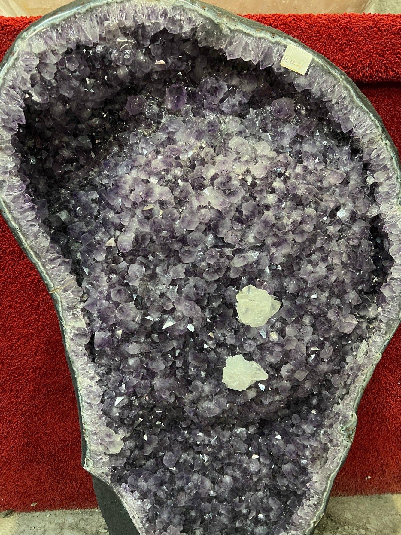 Amethyst geode with calcite crystals – view 2