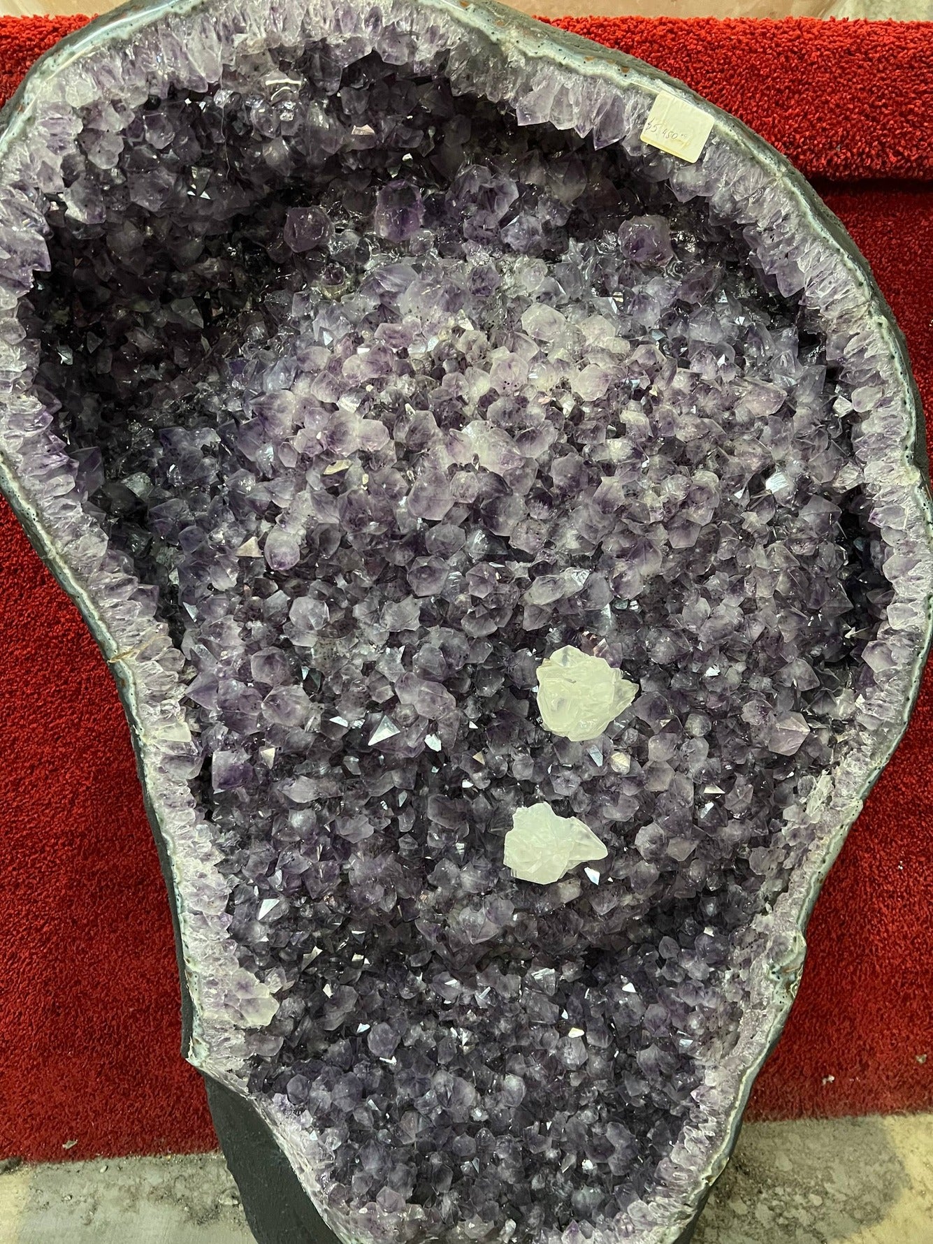 Amethyst geode with calcite crystals – view 3