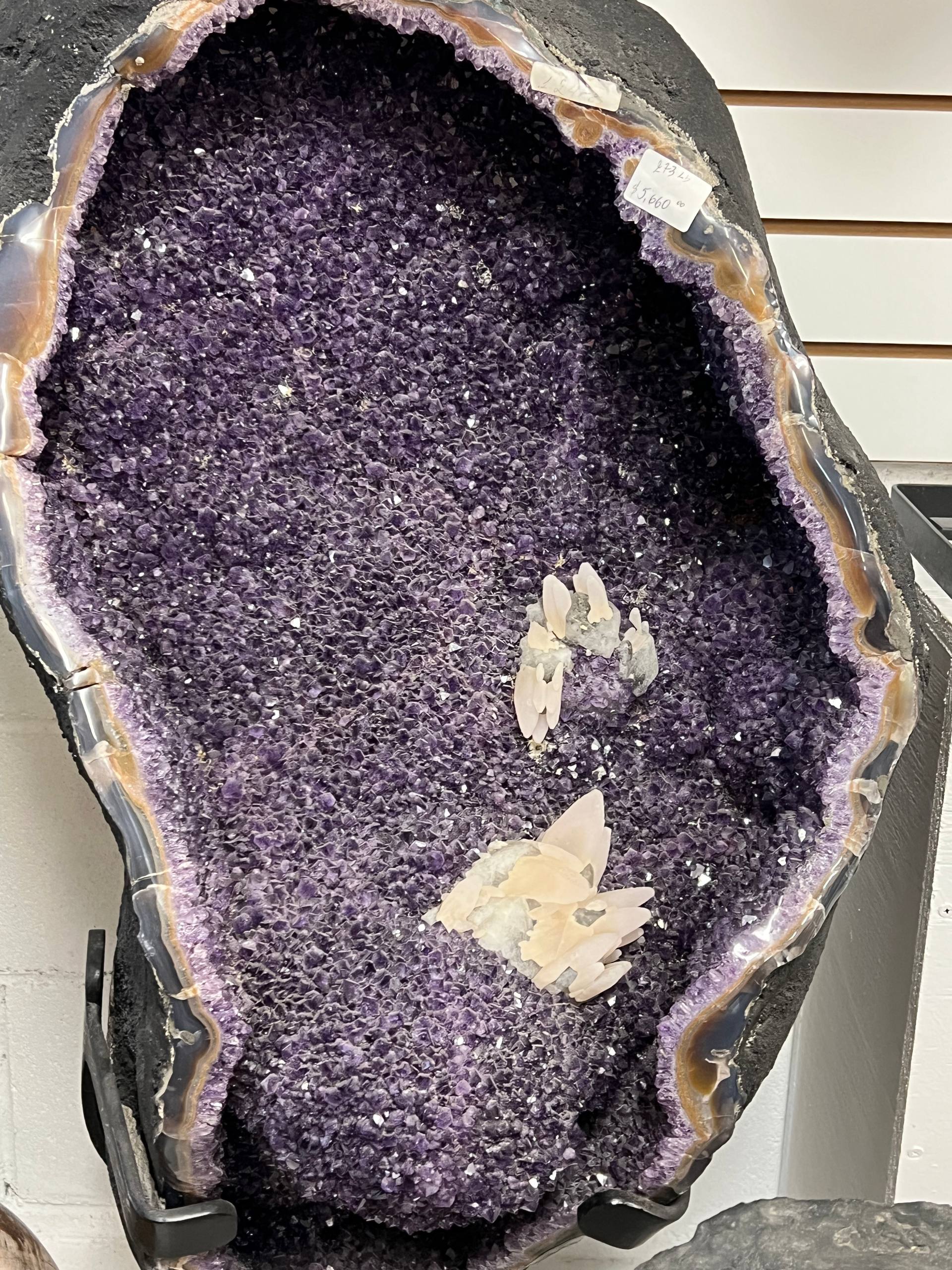 Large amethyst geode with calcite on stands – view 4