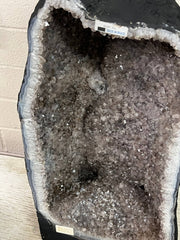 Amethyst geode with large calcite – view 1