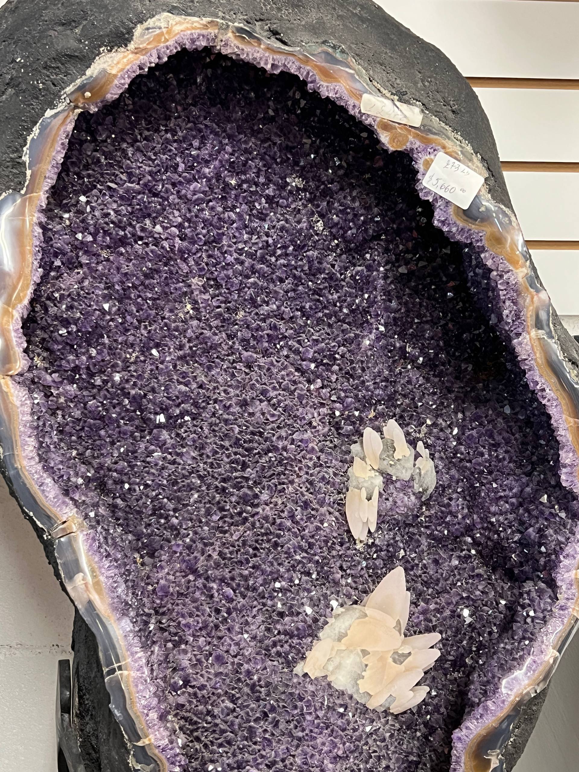 Large amethyst geode with calcite on stands – view 6