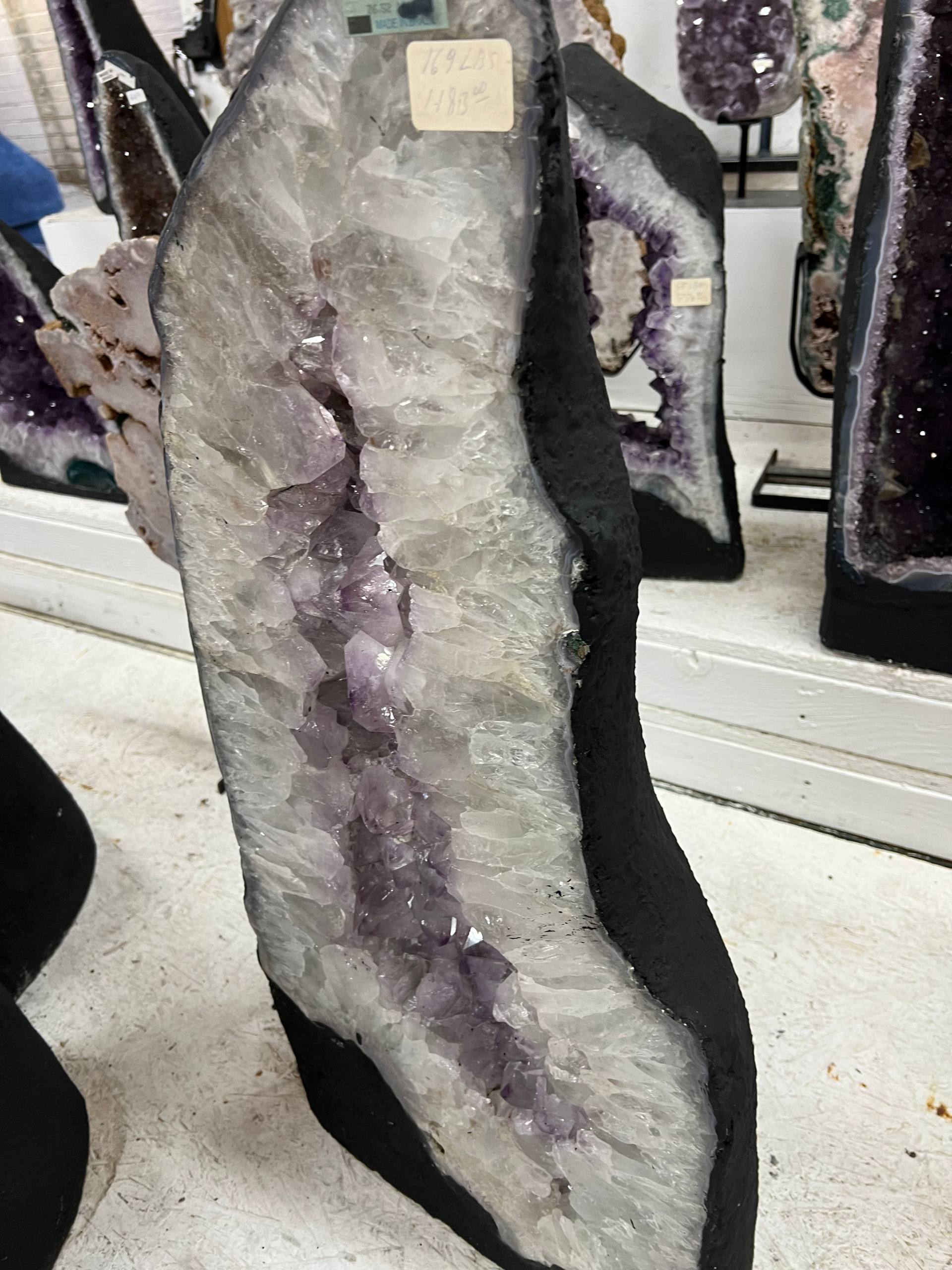 Amethyst geode stands by itself – view 4