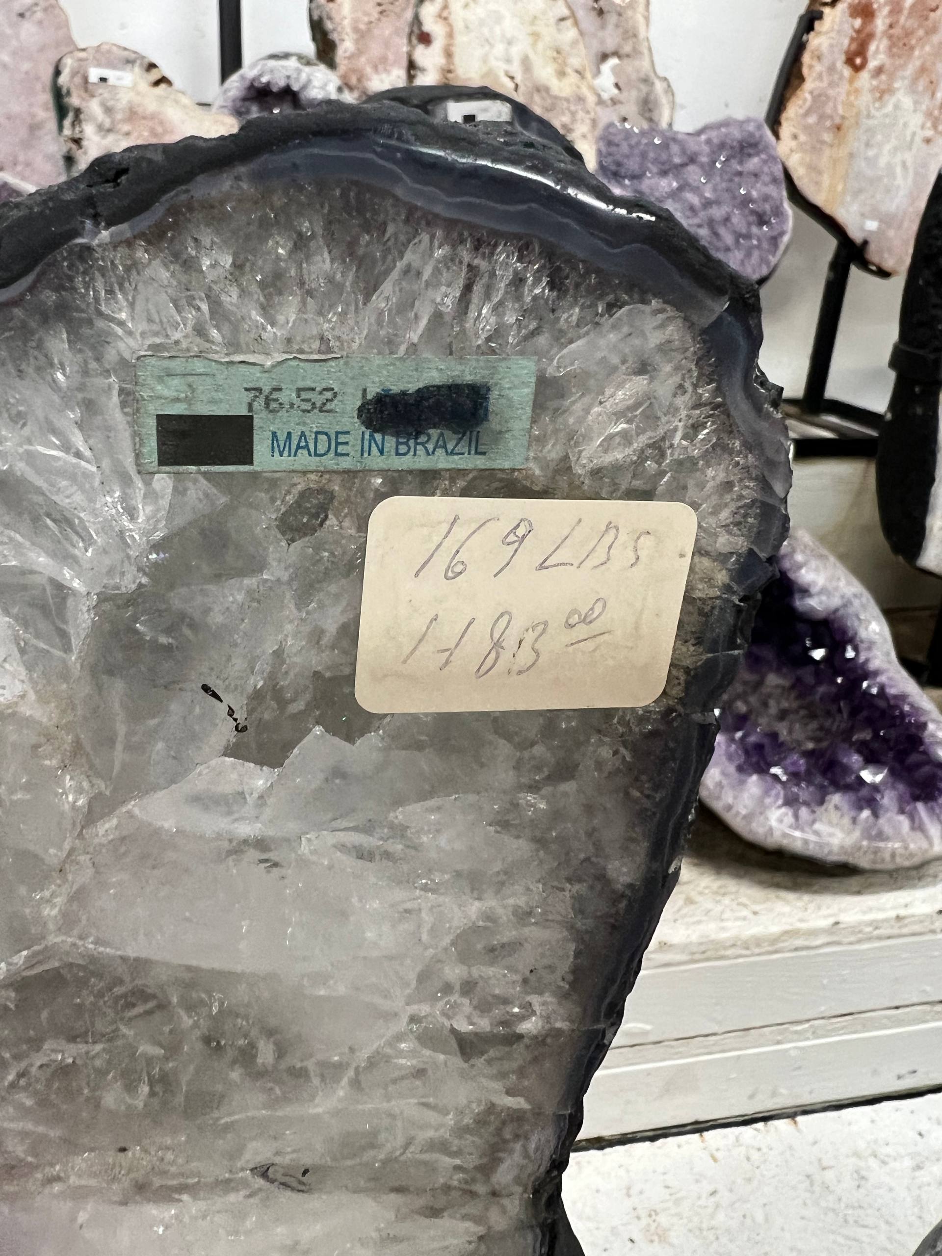 Amethyst geode stands by itself – view 2