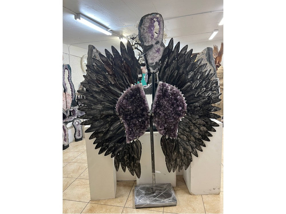 Giant amethyst angel wings — full piece on marble stand