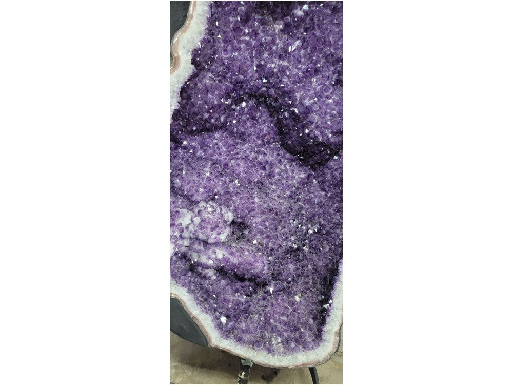Amethyst geode cathedral — side front view on stand