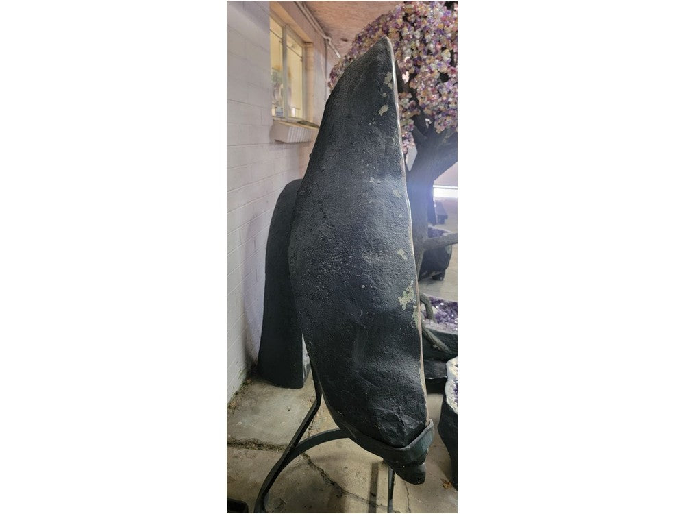 Amethyst geode back side profile on stand