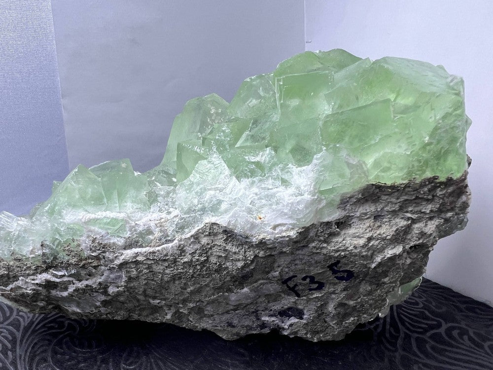 Green fluorite on druzy quartz matrix (Code F5-1)