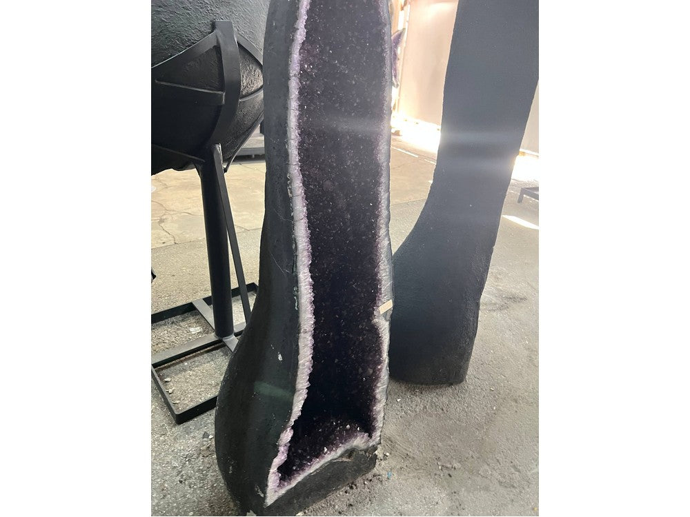 Amethyst cathedral geode — side angle with crystal interior