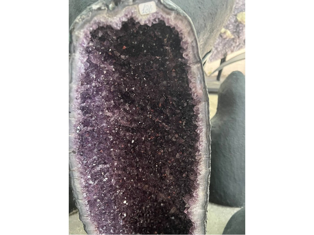 Amethyst crystal cavity close-up — deep violet crystals