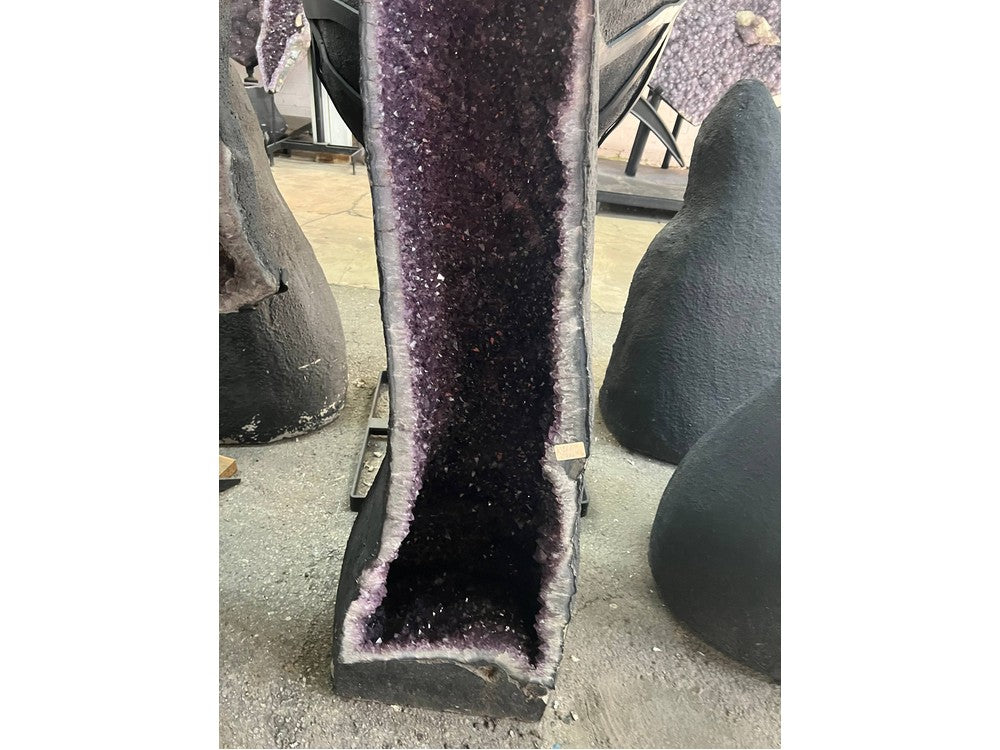 Amethyst geode cathedral — three-quarter view