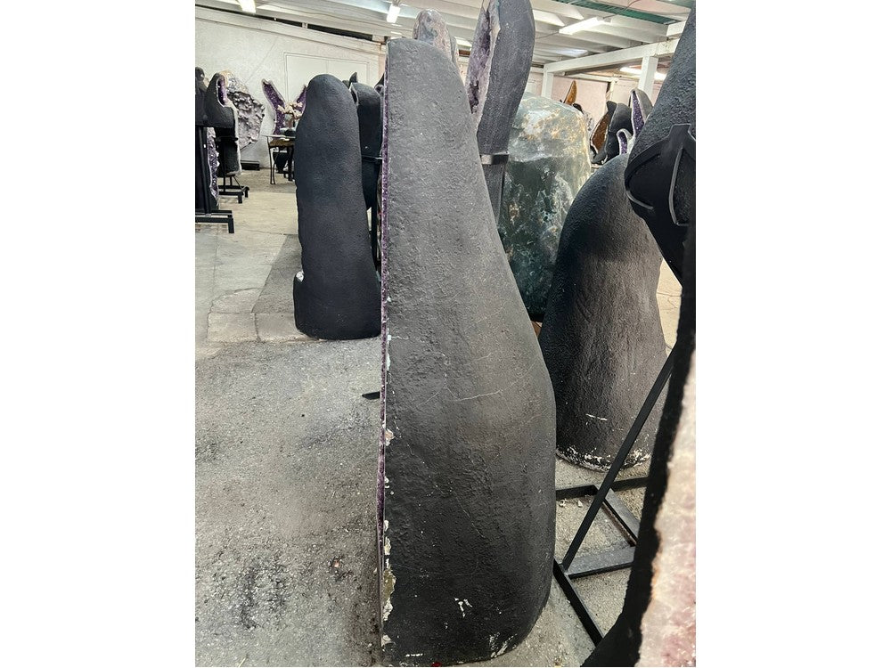 Amethyst geode back showing natural basalt shell