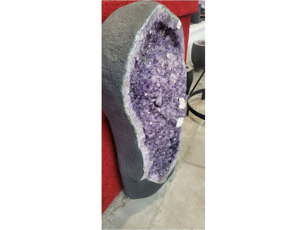 Amethyst geode cavity — rich purple crystals with calcite