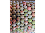 Mookite Jasper bracelet beads close-up showing green and pink natural patterns
