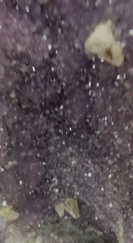 Amethyst geode with calcite