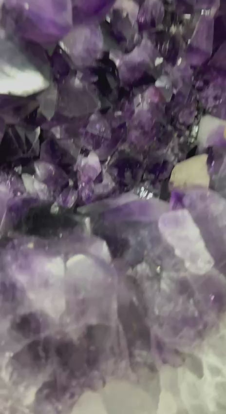 Load video: Amethyst beautiful dark purple color geode with calcite