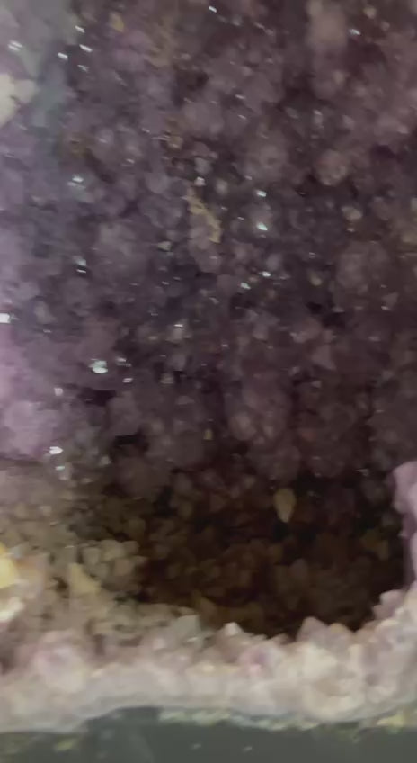 Beautiful dark color amethyst cluster on stand – video