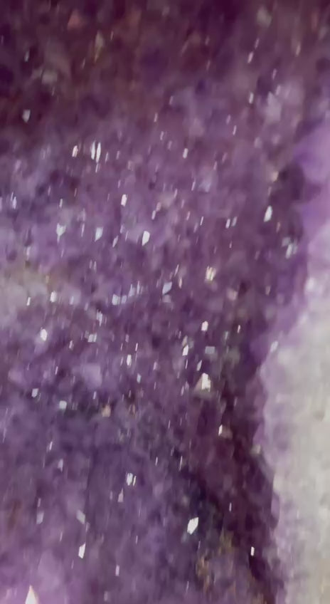 Load video: Amethyst cluster geode light shining colors – video