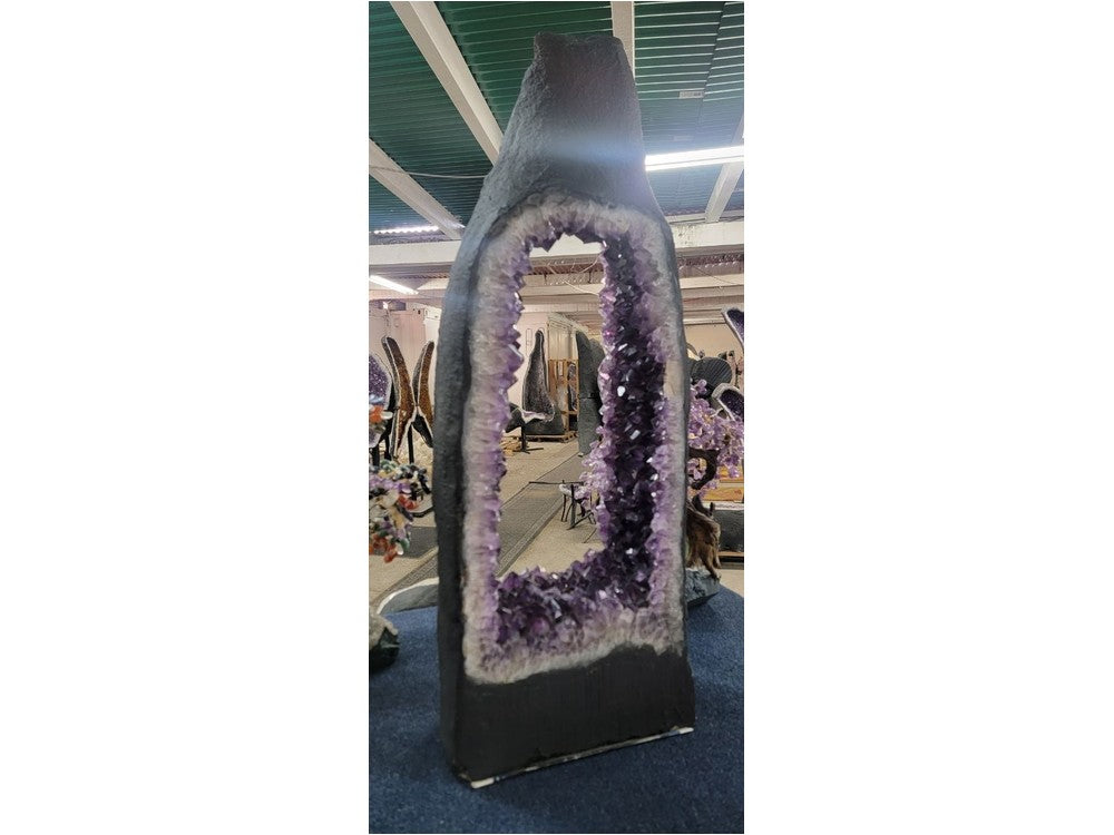 Amethyst cathedral arch geode — wide cavity view