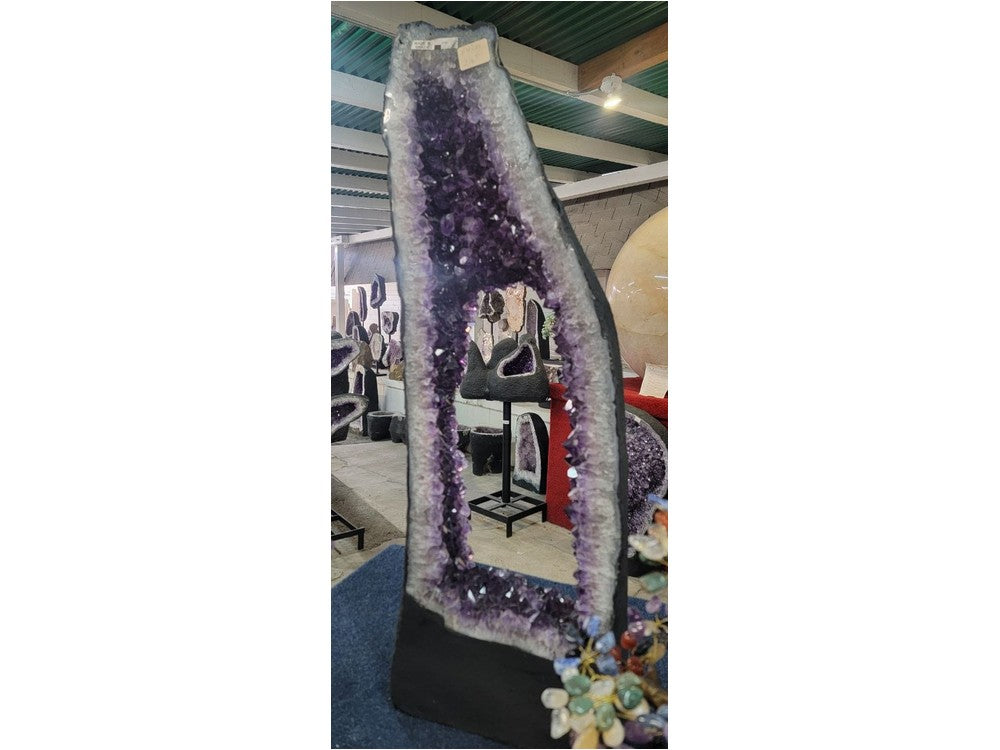 Amethyst geode cathedral — three-quarter view