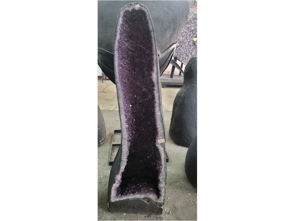 Amethyst geode tower — full body side angle view